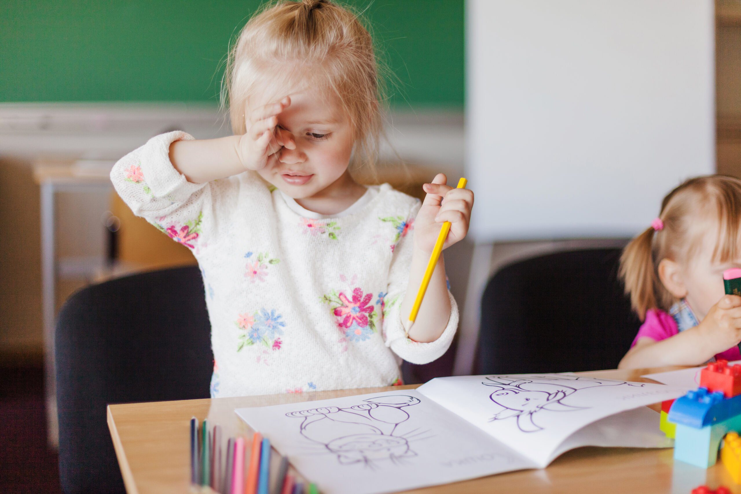 little-girl-with-pencil-painting-coloring-book-1