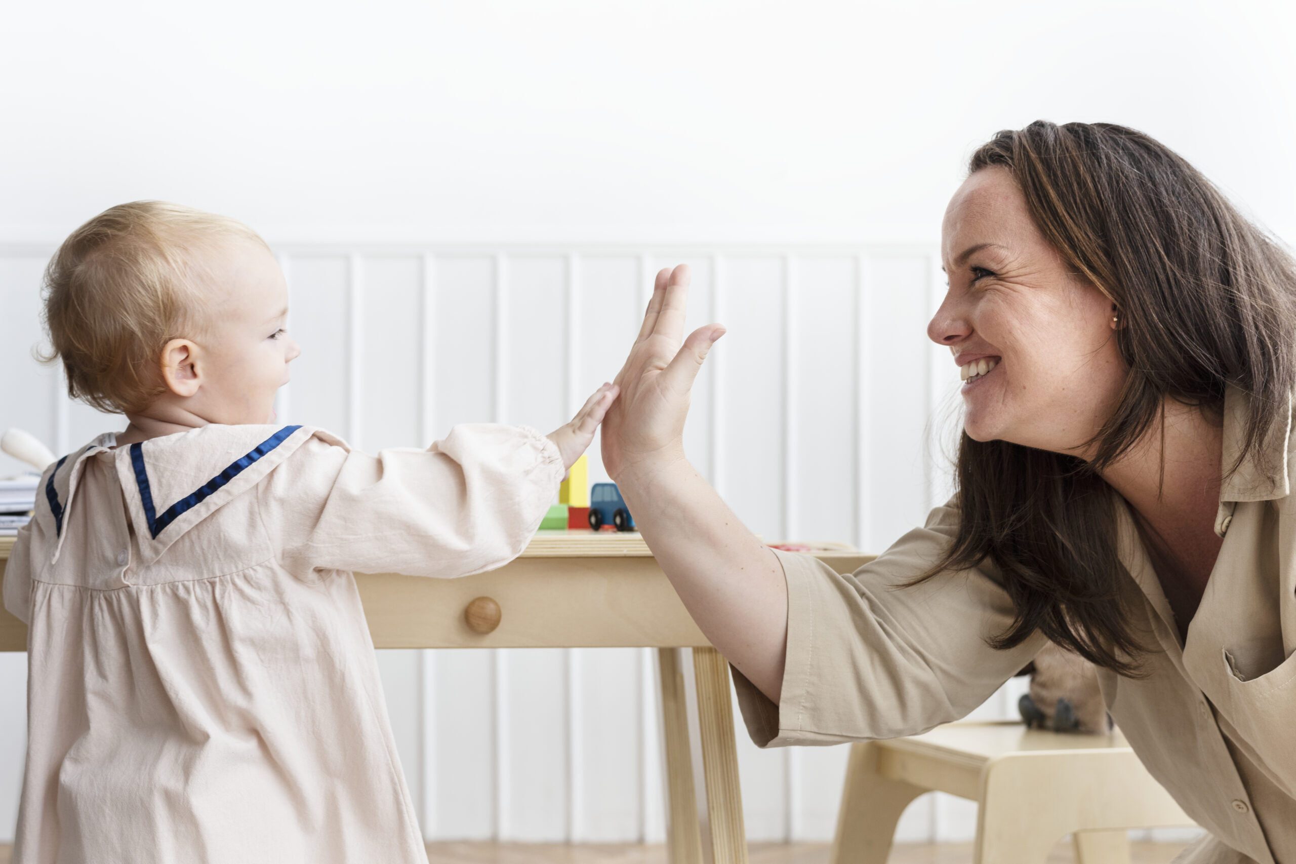 mother-baby-daughter-giving-high-fives-1