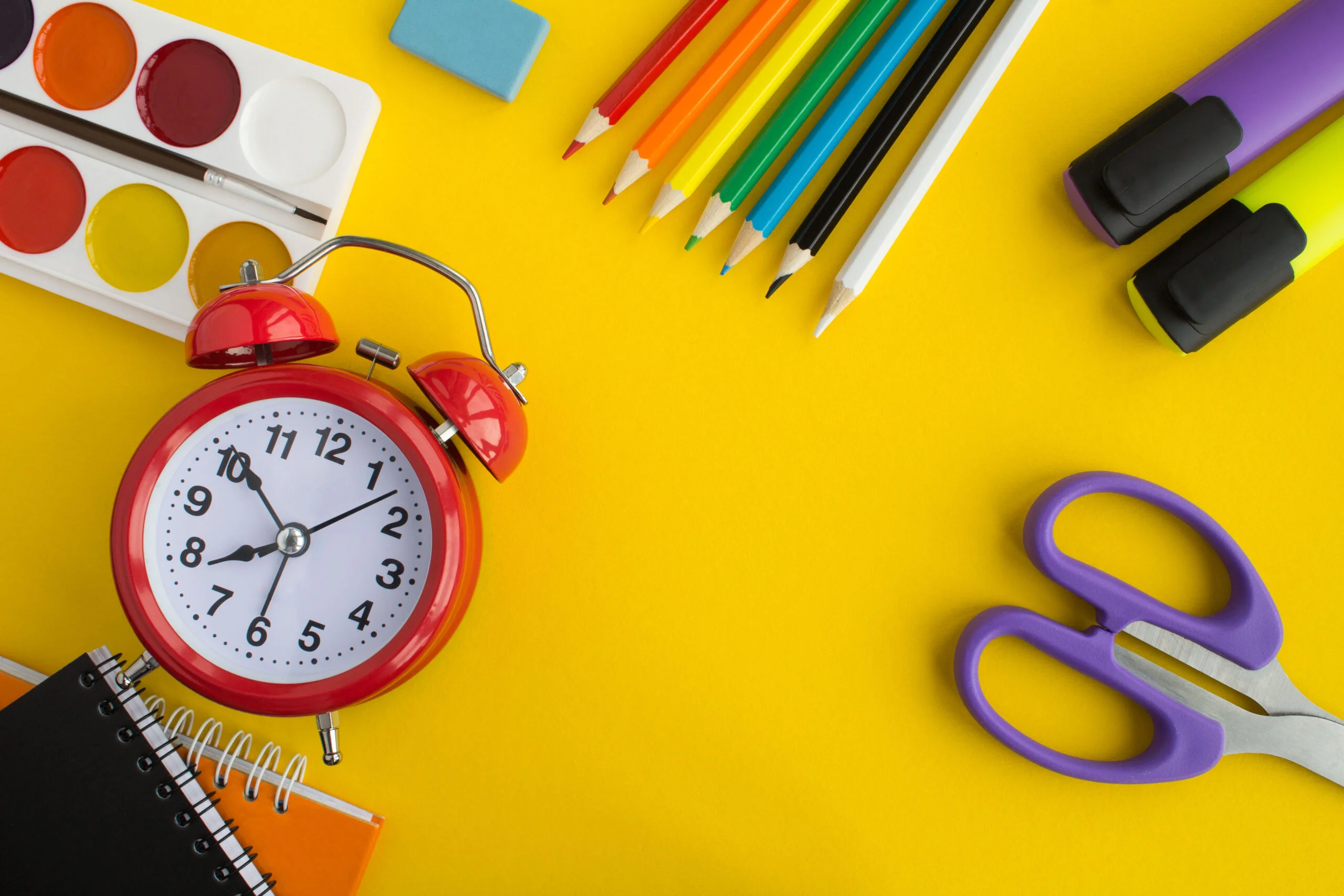 top-view-school-stationery-yellow-surface-1