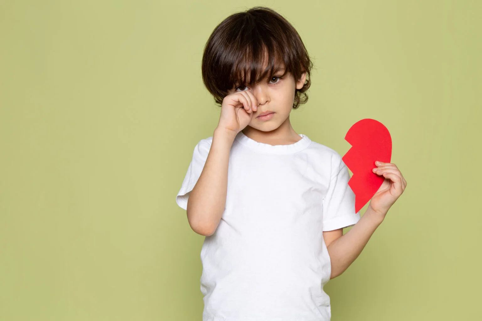 front-view-crying-cute-boy-white-t-shirt-stone-colored-space-1-1536x1024.jpg